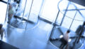People going through a pair of revolving doors.Please see some similar pictures from my portfolio: