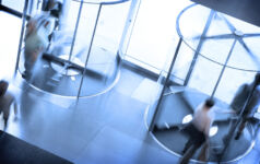 People going through a pair of revolving doors.Please see some similar pictures from my portfolio:
