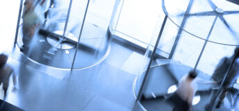 People going through a pair of revolving doors.Please see some similar pictures from my portfolio: