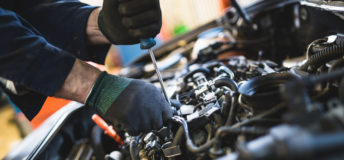 Mechanic working on car