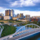 Aerial view of Downtown Columbus, Ohio, with the Scioto River during sunset.