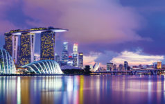 Oaktree adds quartet for new Asia private credit strategy Singapore skyline Vertex Temasek