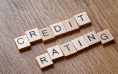 Letter blocks spelling out "credit rating"