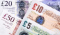 Photo of British pound bills.