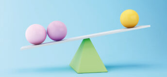 Graphic of two purple spheres and one yellow sphere balancing on top of a green triangle