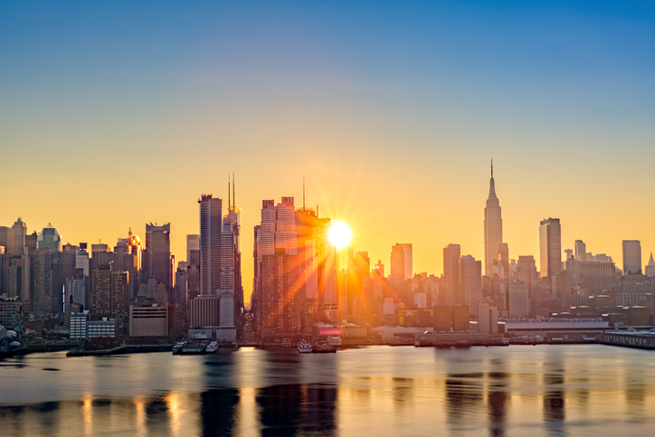 Golden sunrise over New York City's skyline.
