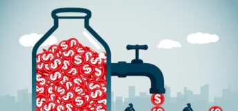 dollars in a class jar coming out of a tap
