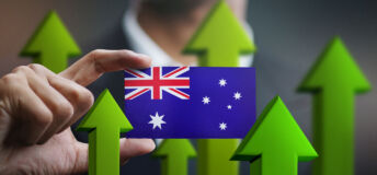 Nation Growth Concept, Green Up Arrows - Businessman Holding Card of Australia Flag