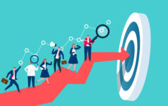 Fund performance indices hit the market Businesspeople working on top of a red arrow as it approaches its goal