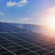 Solar panels with sunset and blue sky background. Clean power energy concept
