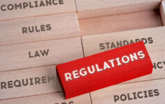 The stress test is just the beginning Wooden blocks with words written on them individually, representing the concept of regulations.