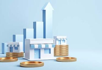 Positive signals are seeing lenders look ahead to next-gen retail Photo of store fronts with gold coins and arrows pointing upward behind the buildings.