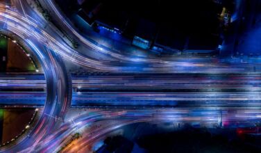 AlbaCore and MUFG team up for infrastructure debt platform Photo illustration of highway road infrastructure.