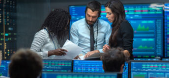 Photo of a team analyzing data