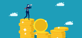 Image of a business person standing on a stack of coins.