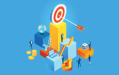 Photo of fundraisers attempting to reach their goal, represented by a target.