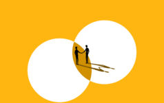 Image of two people shaking hands.