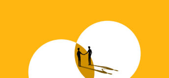 Image of two people shaking hands.