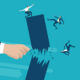 A large fist punches and breaks a tower 3 businessmen are standing on