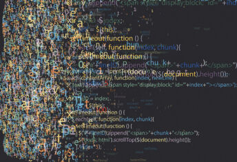 A human face made up of computer code