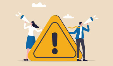 Loan Note: LPs are keeping faith with a besieged asset class; Three Hills wraps up impact vehicle Figures with loud hailers issuing warnings holding ! sign