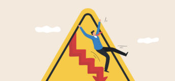 A yellow hazard sign shows a man falling down stairs