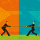 6 businessmen play tug of war with a large rope