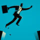 Appetite for private credit remains strong among institutional investors A businessman jumps from a crumbling cliff onto a safe cliff