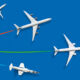 A picture of 4 planes flying in the sky