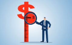 Image of a magnifying glass over a dollar sign, measuring.